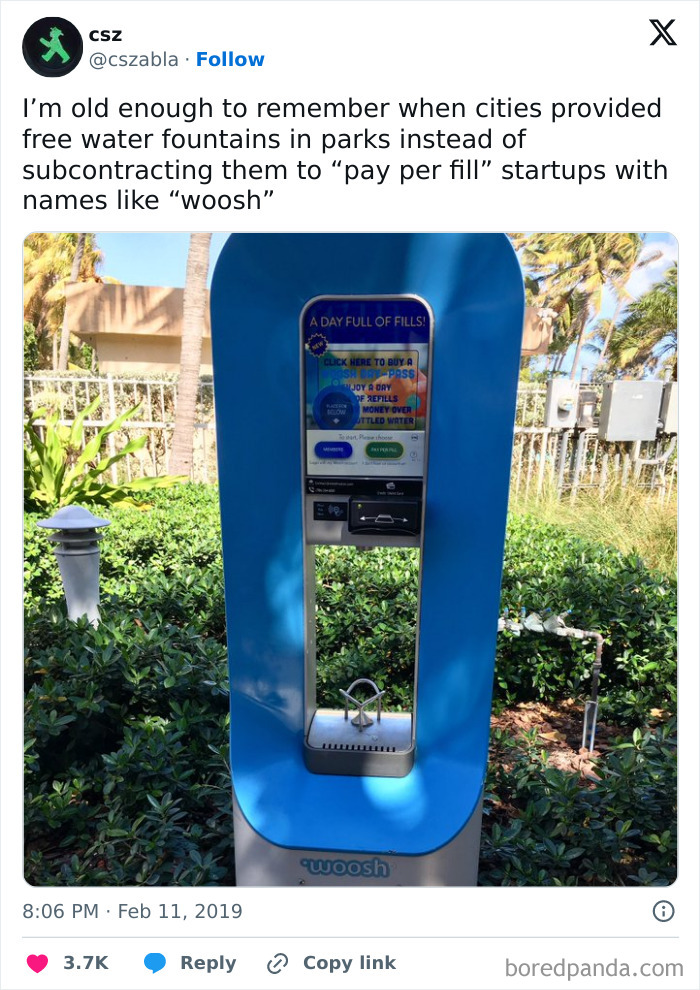 Pay-per-fill water fountain machine in a park, reflecting concerns about environmental changes and point of no return.