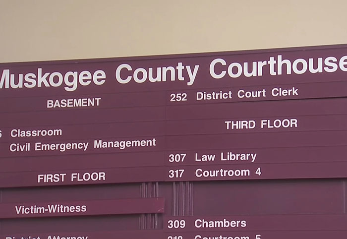 Muskogee County Courthouse directory sign, related to stepdad and mom felony charges after 11-year-old birth at home.