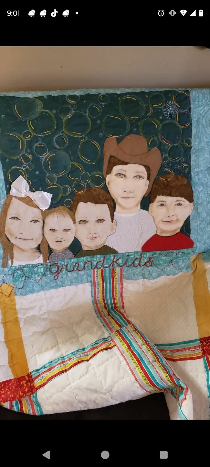 DIY project quilt featuring stitched portraits of five children with the word grandkids embroidered on fabric background.