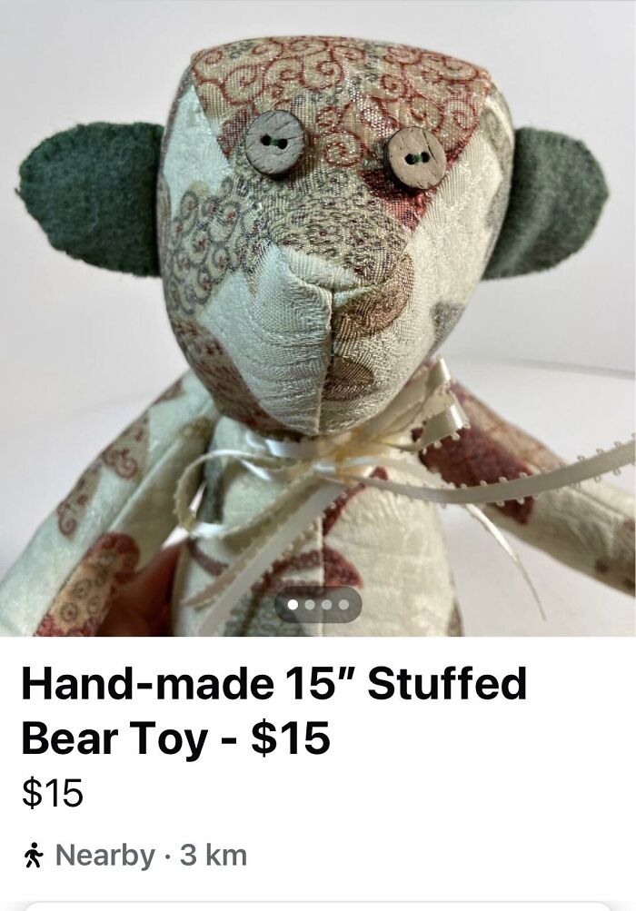 Fabric stuffed bear toy with mismatched button eyes and uneven stitching, an example of craft shaming DIY projects.