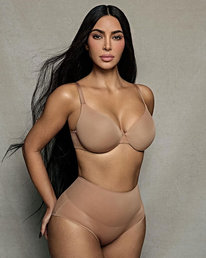 Kim Kardashian modeling see-through Skims lingerie in neutral tones, highlighting the looks like diaper design debate. Kim Kardashian modeling see-through Skims lingerie in neutral tones, highlighting the looks like diaper design debate.