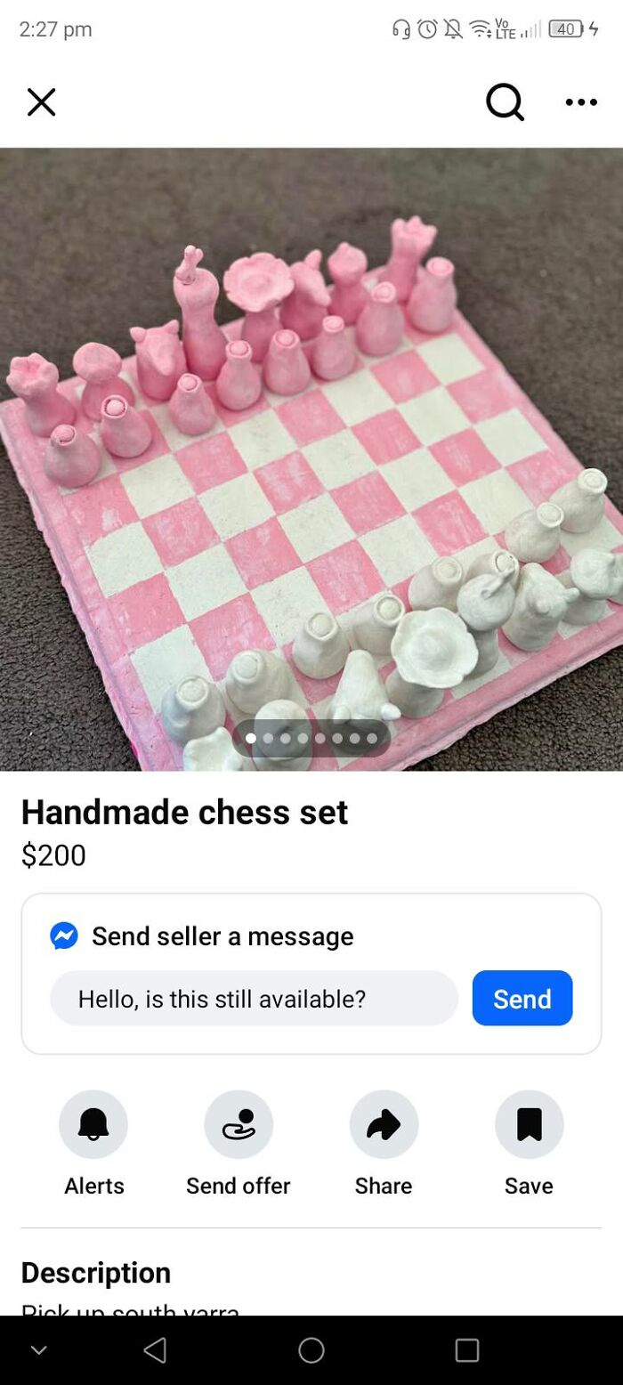 Handmade DIY chess set with pink and white pieces on a checkerboard, showcasing craft shaming for horrendous projects.