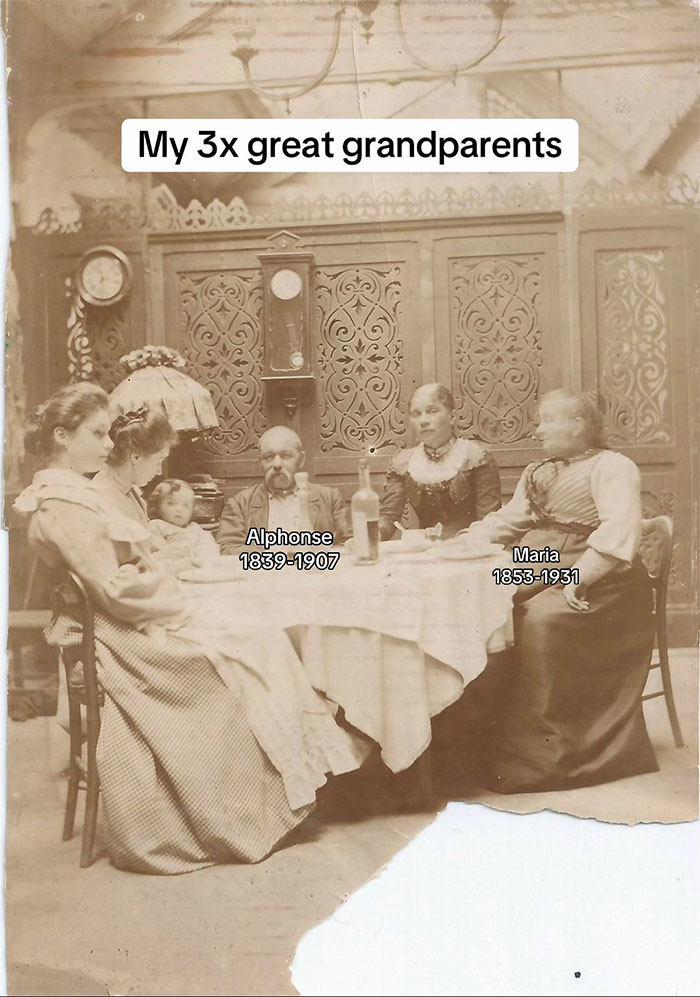 Sepia photo of 3x great grandparents at a table, illustrating family historian&rsquo;s inspiration to share family tree online.
