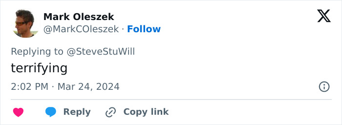Tweet from Mark Oleszek showing the word terrifying in response to a Twitter user&rsquo;s post on a white background with his profile picture.