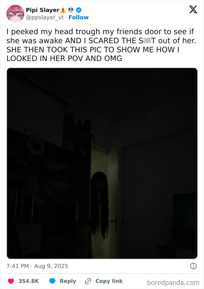 Dark room photo of a person with long hair peeking through a door, illustrating funny and relatable tweets from August.