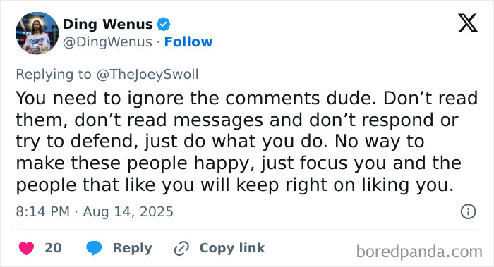 Tweet from Ding Wenus advising Joey Swoll to ignore negative comments and focus on supporters in a heated discussion on social media.