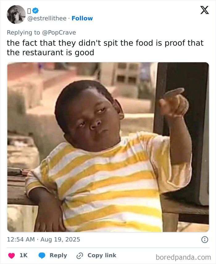 Child in yellow striped shirt leaning back and gesturing inside a restaurant where SUV crashed into couple eating.