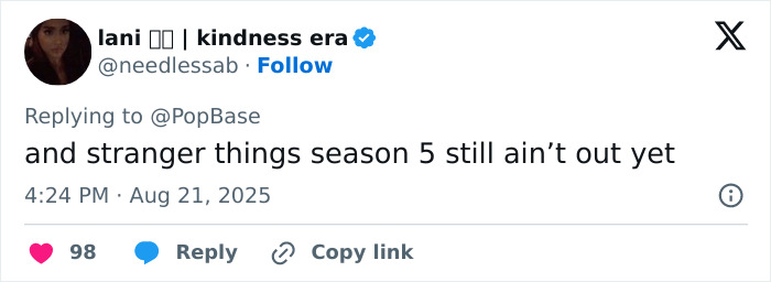 Screenshot of a Twitter reply discussing Millie Bobby Brown&rsquo;s baby adoption debate and fans questioning her age and career choices.