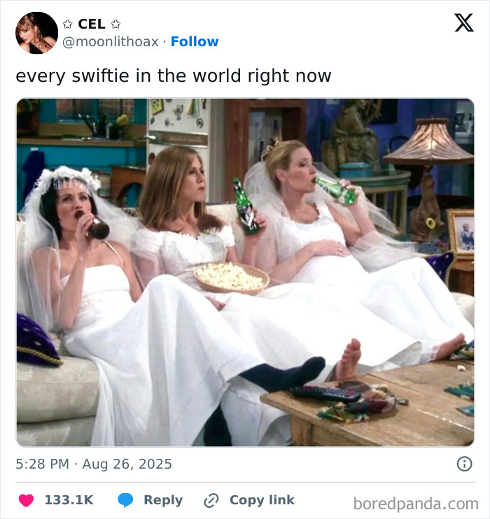 Three women in wedding dresses drinking beer and eating popcorn, reacting with humor to Taylor Swift engagement memes.