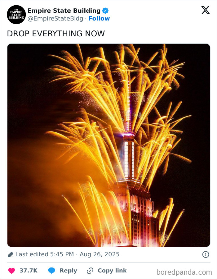 Empire State Building lit up with bright golden fireworks, celebrating Taylor Swift engagement reactions and memes.