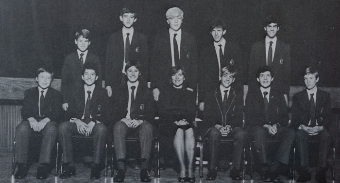 Black and white group photo of young men in school uniforms and a woman seated in the center, related to Kenyan man Elon Musk claim. - 6