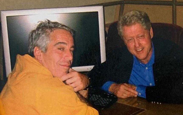Jeffrey Epstein and Bill Clinton sitting together in a casual setting, linked to Epstein jail video missing minutes and DOJ claims. - 3