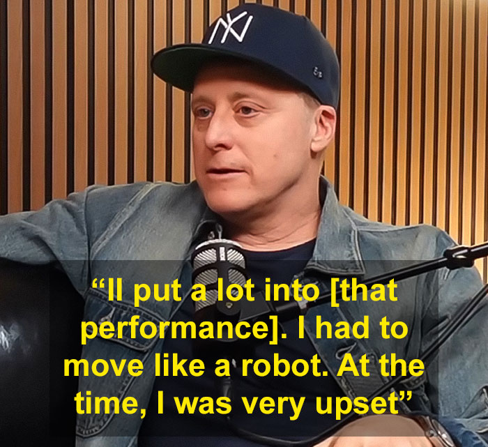 Man wearing a blue NY cap and denim jacket, discussing Will Smith's co-actor accusing studio of removing his name.