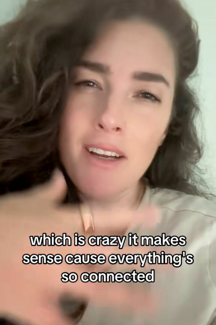 Woman with curly hair explaining a tiny habit that could help prevent heart attack and dementia.