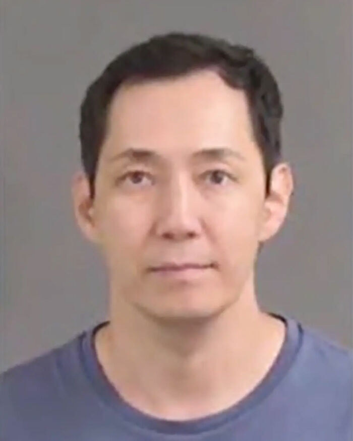 Mugshot of a man involved in an Uber driver incident with a service dog knocking out CEO in shocking video.