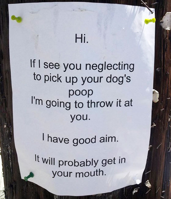 Note from unhinged neighbor warning to pick up dog p**p or face having it thrown with good aim in a residential area.
