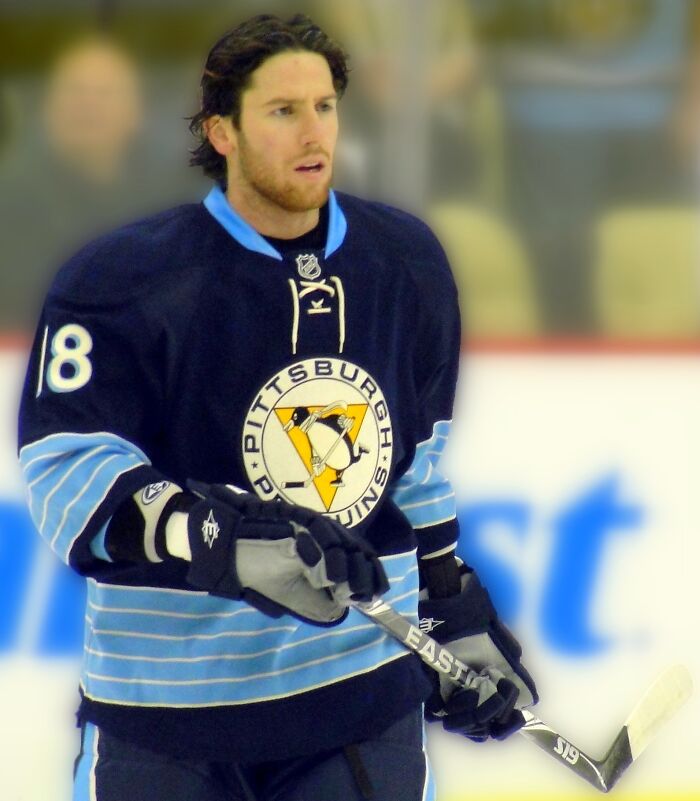 Hockey player in Pittsburgh Penguins jersey on the ice, illustrating PR campaign and decisions fails concept.