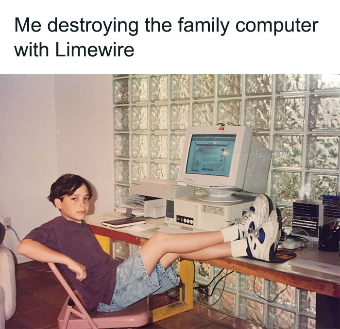 Boy with legs on desk using old desktop computer with Limewire, capturing nostalgic 90s tech and simpler stranger days vibe.