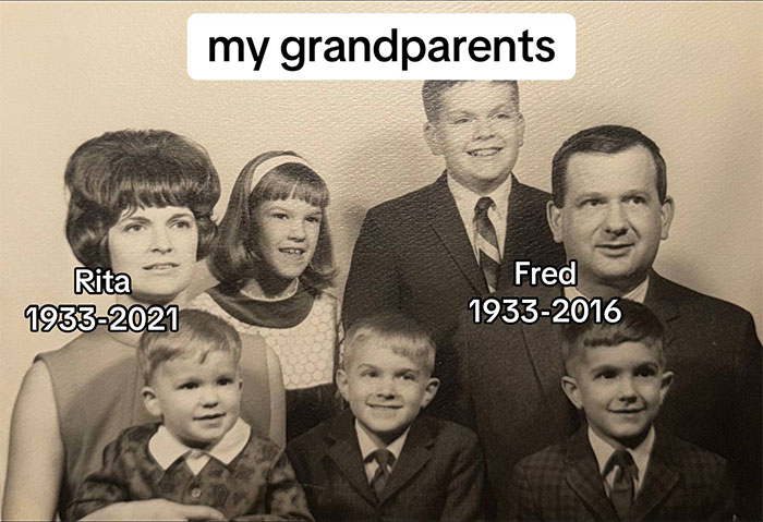 Black and white family photo of grandparents and children, illustrating family historian inspiring sharing family tree online.
