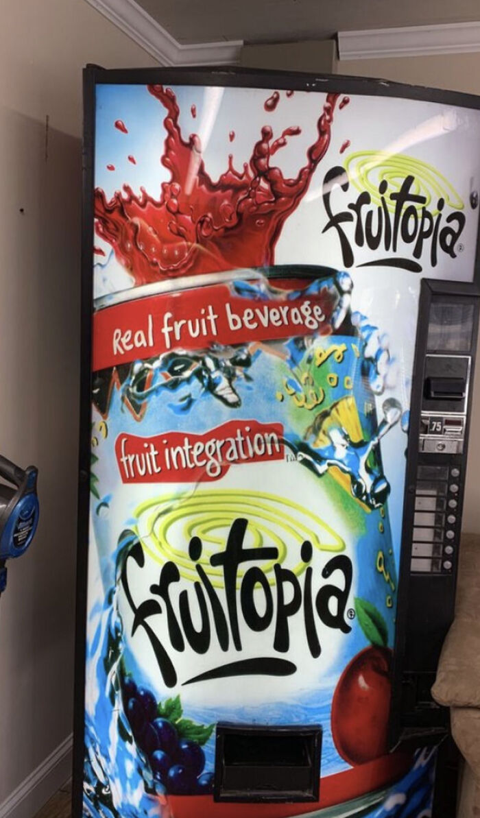 Vintage Fruitopia vending machine featuring colorful splash design, evoking 90s nostalgia and simpler, stranger days.