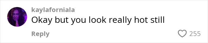 TikTok comment from user kaylaforniala complimenting a mom with over 30 tattoos in an online debate.