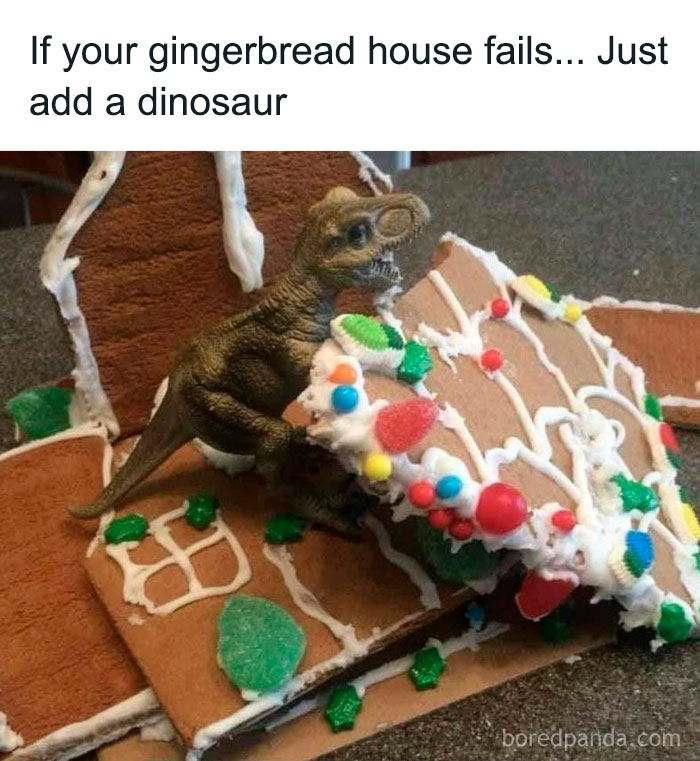 Toy dinosaur holding a broken gingerbread house roof showcasing ingenious crafty ideas from a popular Instagram account.