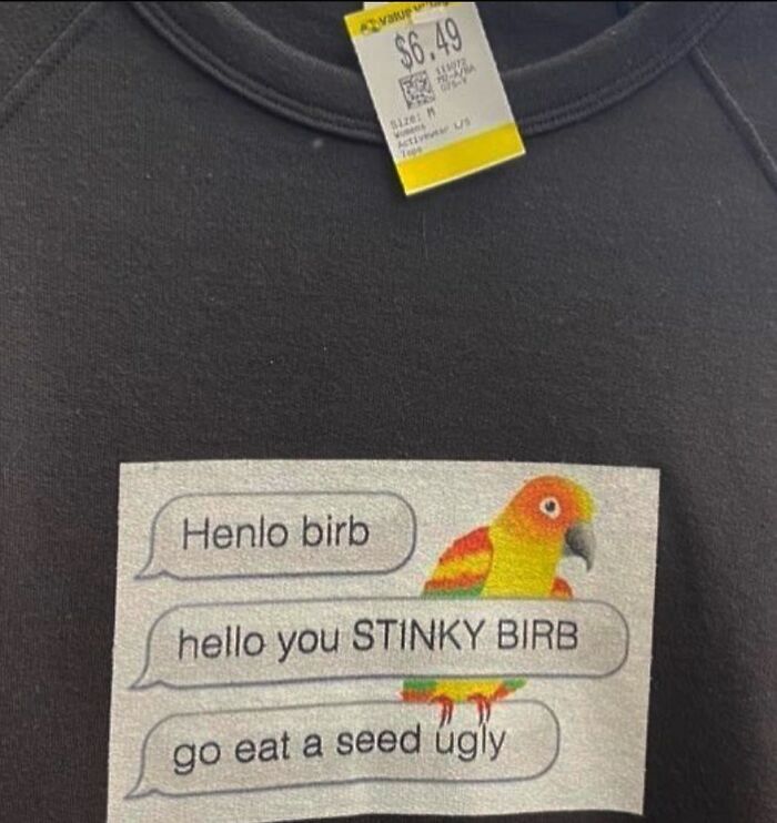 Black thrift store shirt with a humorous bird meme saying stinky birb and go eat a seed ugly.