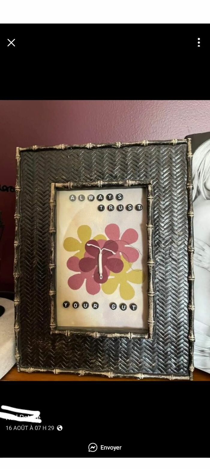 Framed craft project with beads spelling always trust your gut and a DIY flower with an unusual shape inside.