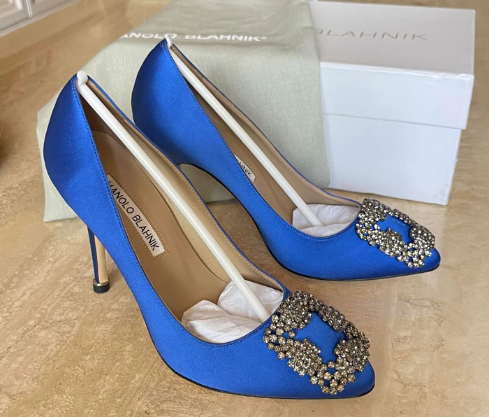 Blue satin Manolo Blahnik wedding shoes with jeweled embellishments, showcased as part of unhinged wedding spends collection. - 35