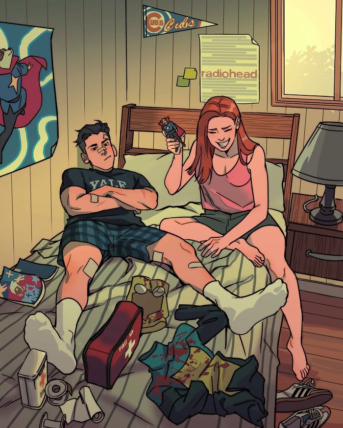 Teen Titans character reading comics in a room, showcasing Gabriel Picolo’s stunning visual storytelling of relatable young heroes.