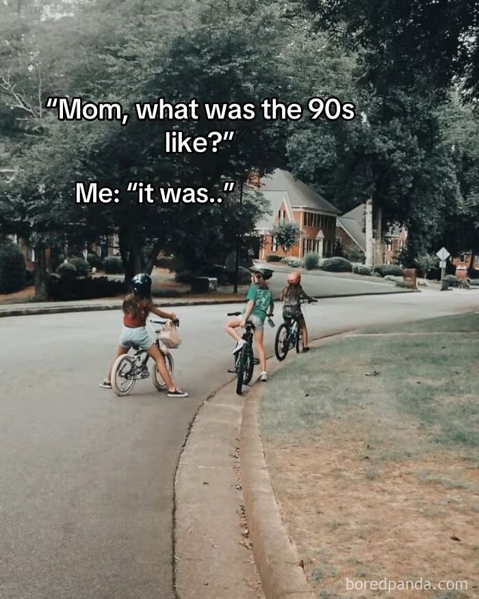 Three children riding bikes on a neighborhood street with a meme about parenting and cool mom humor.
