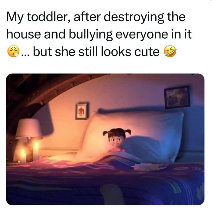 Toddler in bed after causing chaos at home, capturing the humorous and relatable moments of being a cool mom and parent.
