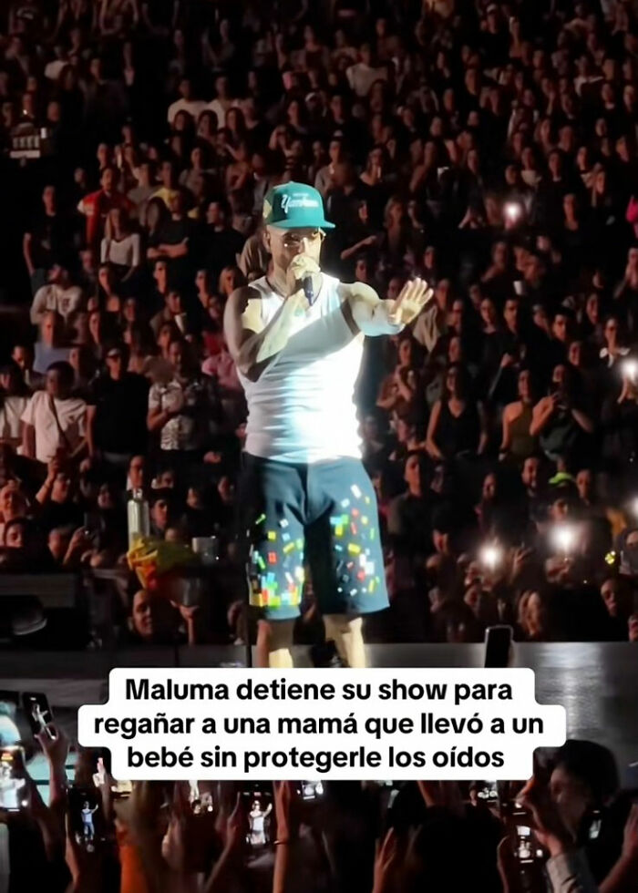 Singer stopping concert to address irresponsible mom in crowd with baby, sparking divided reactions from audience. Singer stopping concert to address irresponsible mom in crowd with baby, sparking divided reactions from audience.