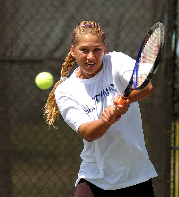 Anna Kournikova playing tennis on court, showcasing her athletic skills before pregnancy announcement at 44. Anna Kournikova playing tennis on court, showcasing her athletic skills before pregnancy announcement at 44.