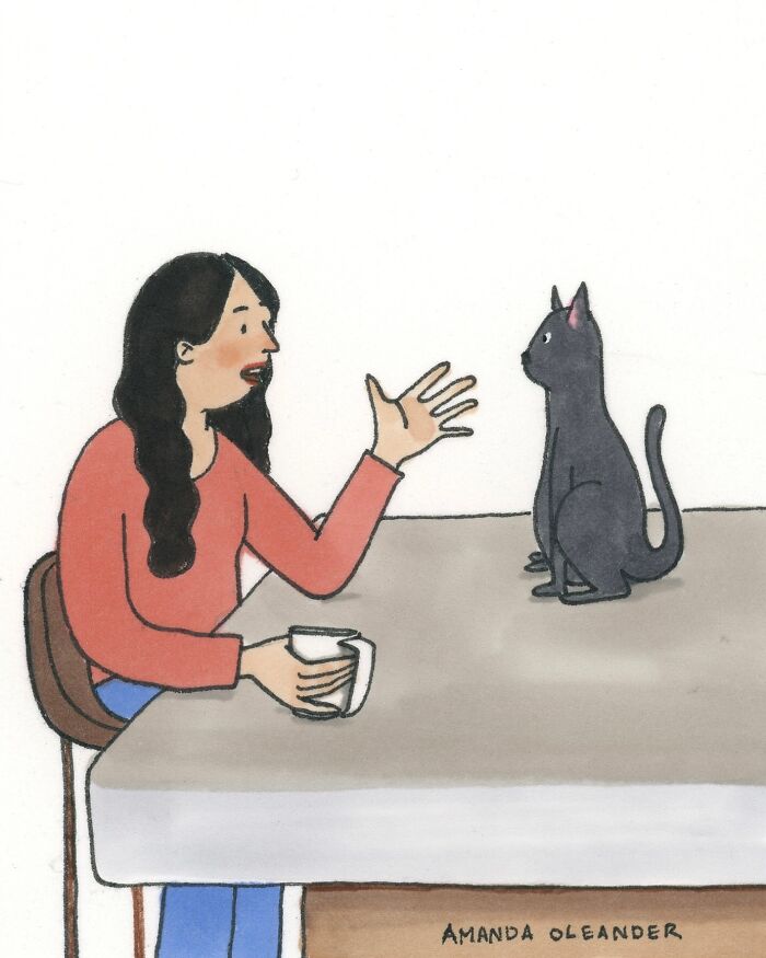 Woman with cup talking to a black cat across the table in a wholesome illustration of private moments.