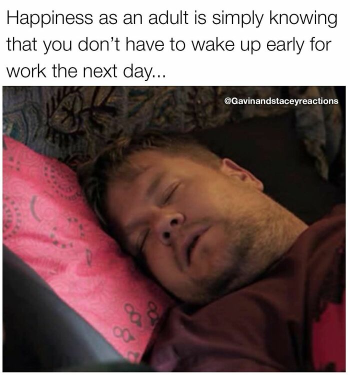 Adult man sleeping peacefully, enjoying happiness from not waking up early for work, a relatable work meme.
