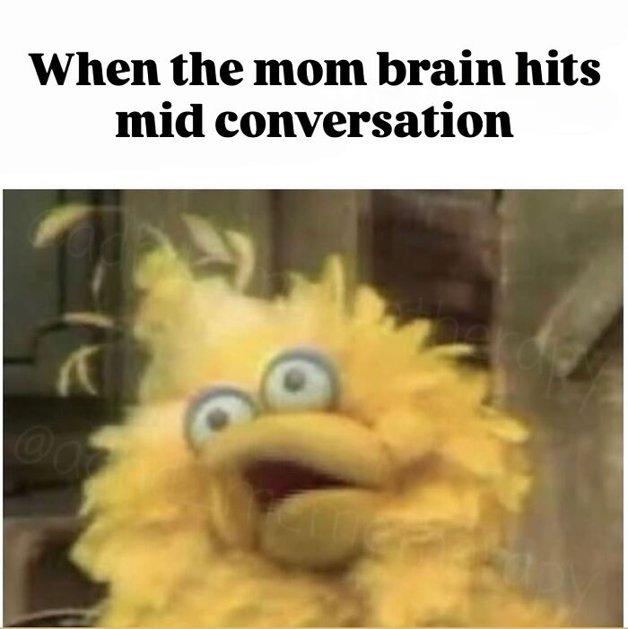 Blurred image of a yellow bird puppet with wide eyes, illustrating a mom moment, capturing the cool mom parenting experience.