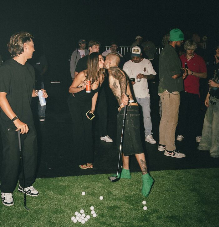 Justin and Hailey Bieber share a moment at night on a golf course amid troubled marriage and album success. Justin and Hailey Bieber share a moment at night on a golf course amid troubled marriage and album success.