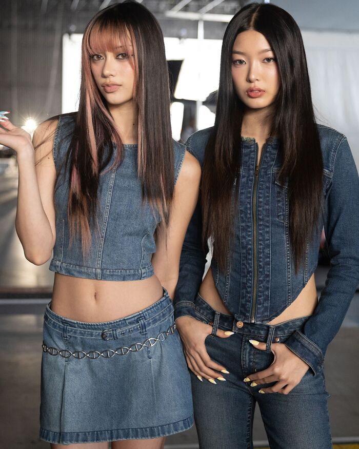 Two models wearing denim outfits in a Gap jeans ad responding to American Eagle campaign.