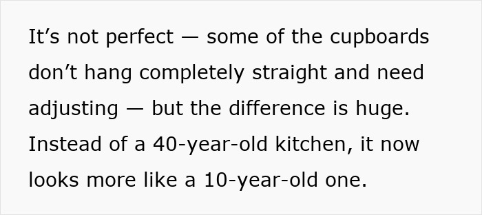 Woman proudly showcasing her DIY kitchen makeover with updated cupboards and fresh new look.