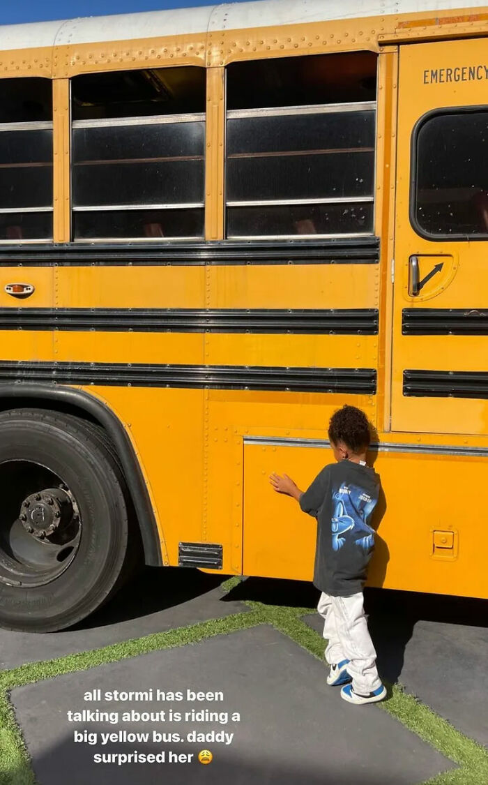 Child excitedly approaching a big yellow school bus, illustrating relatable celebrity moments that seem out-of-touch.