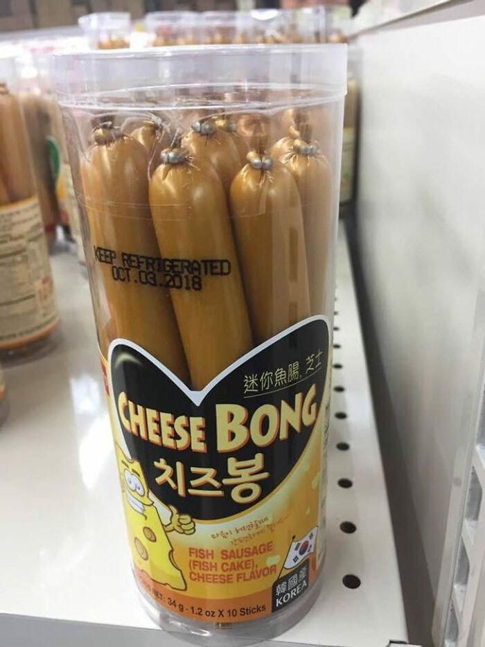 Packaged cheese-flavored fish sausage sticks on store shelf, an example of food nobody should eat for health.