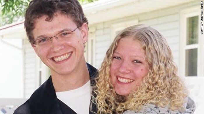 Smiling young man and woman outside a house, an example of unsettling images from the Morbid Knowledge online group.