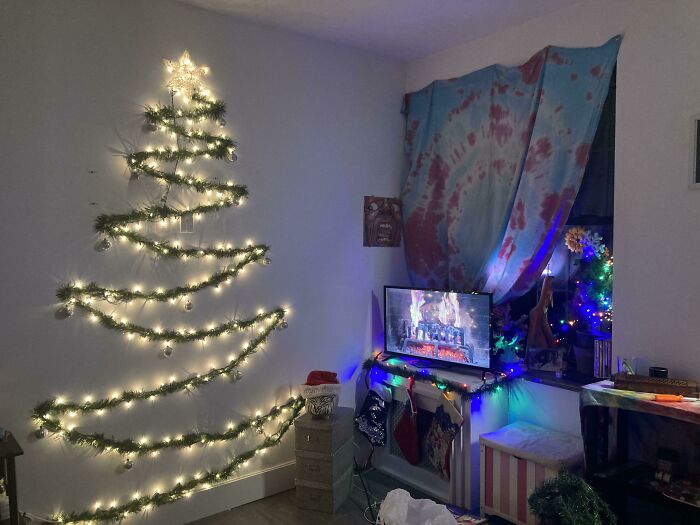 Minimalist Christmas decoration with lights shaped like a tree on the wall in a quirky home setting. - 10