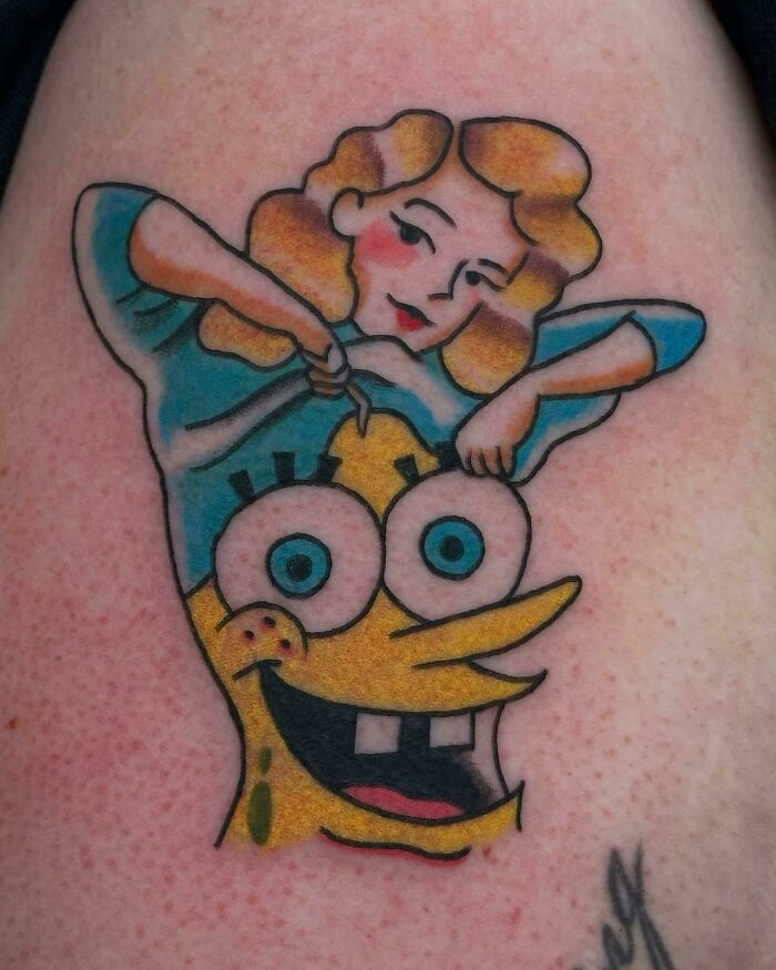 Tattoo combining a vintage cartoon woman and a yellow cartoon character, showcasing awful taste but great e*******n example.
