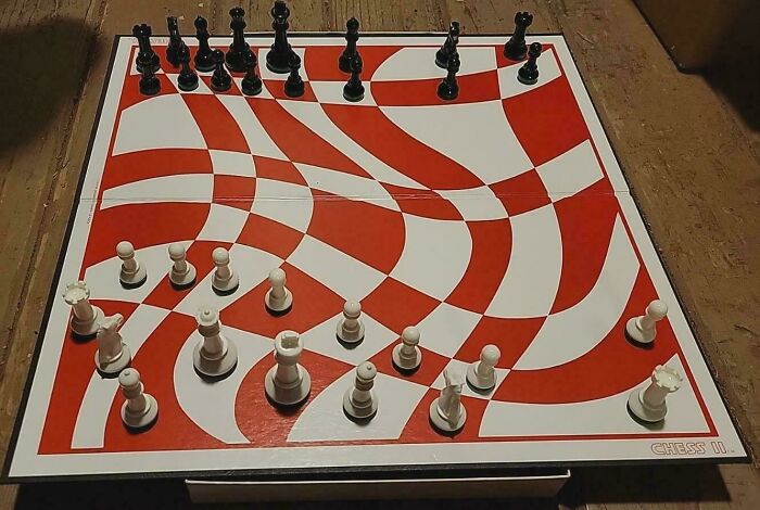 Chessboard with a distorted red and white pattern, illustrating an example of awful taste but great e*******n in design.