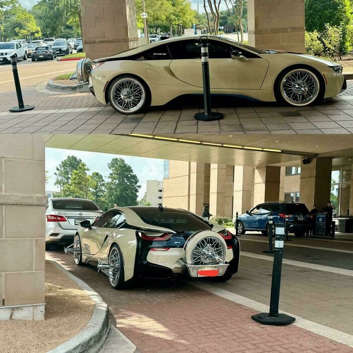 Luxury sports car with oversized wire-spoke rims and unique spare tire mount showing awful taste but great e*******n.