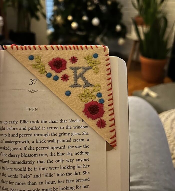 Embroidered corner bookmark with letter K and floral design, a thoughtful gift for friends barely holding it together.