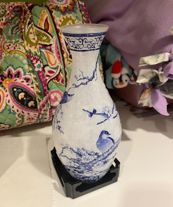 Decorative blue and white ceramic vase with bird design, a thoughtful gift for a friend barely holding it together.