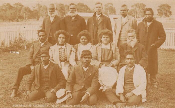 Group portrait of Indigenous Australians from the 1900s in Hobart, showcasing rare glimpses into early 20th-century life.